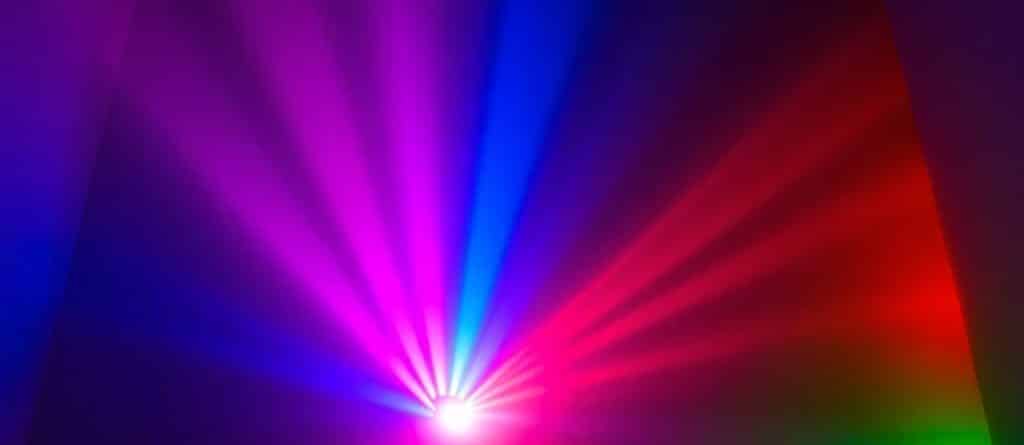 Bright neon lights in various colors illuminating a space.
