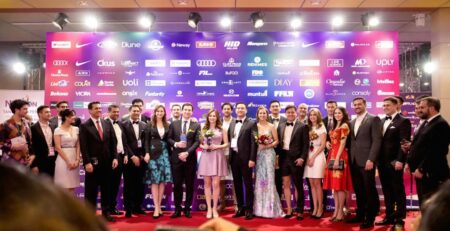 Red carpet event with a custom banner.