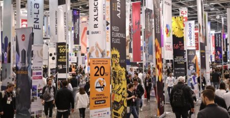 Modern retractable banners in a bright convention hall.