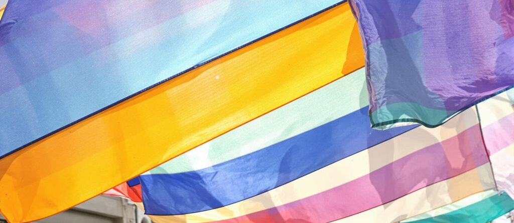 Colorful banners fluttering outdoors.