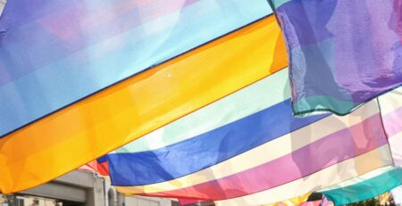 Colorful banners fluttering outdoors.