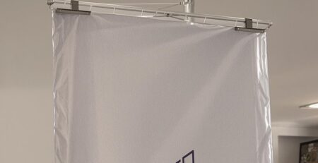 Large banner stand in a professional setting.
