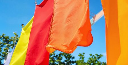 Colorful banners flapping in gentle breeze.