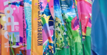 Colorful banners fluttering outdoors.