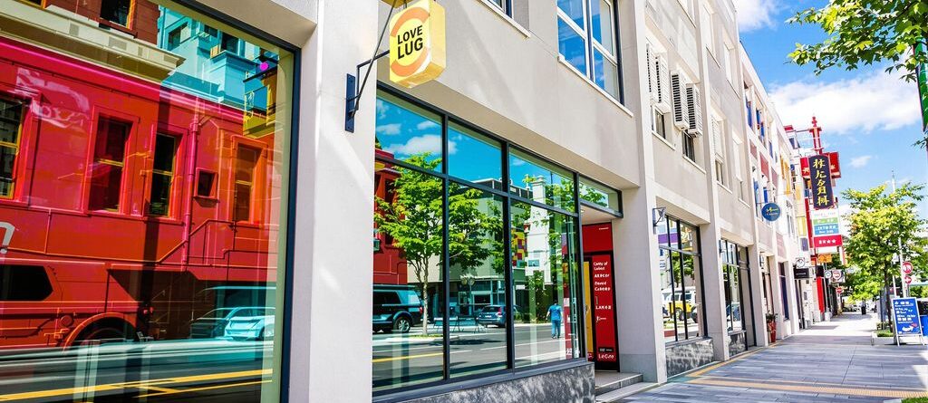 Vibrant storefront, clear sky