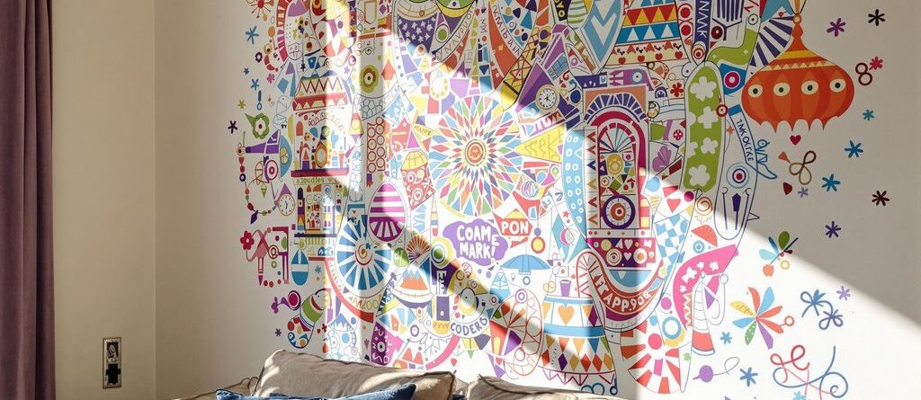 Decorated room with large wall decal.