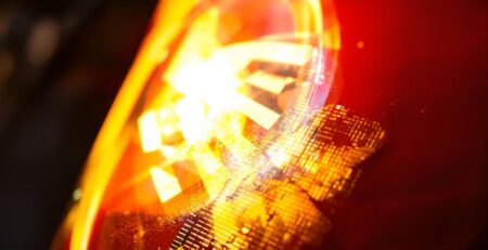 Bright backlit decal illuminates a vibrant brand logo.