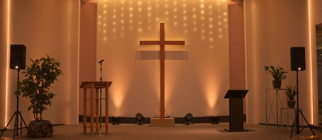 Small church stage with creative lighting