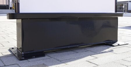 Heavy-duty outdoor banner stand, secure and stable.