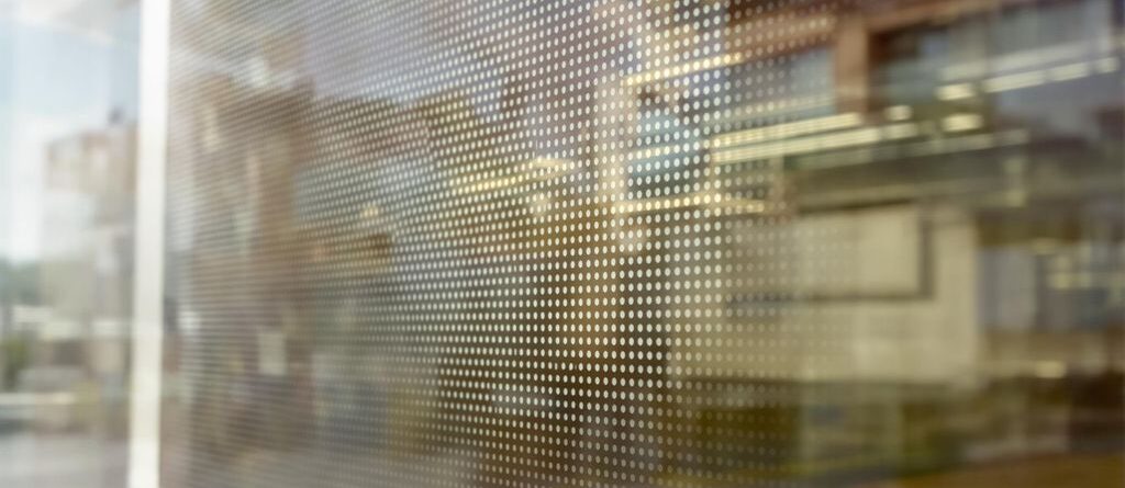 Perforated window decal on building exterior