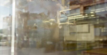 Perforated window decal on building exterior