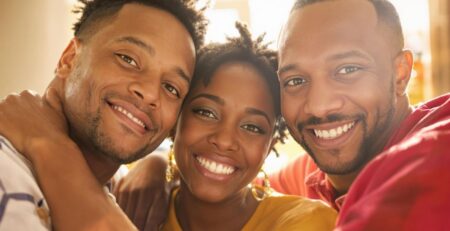Warm family embrace with joyful expressions