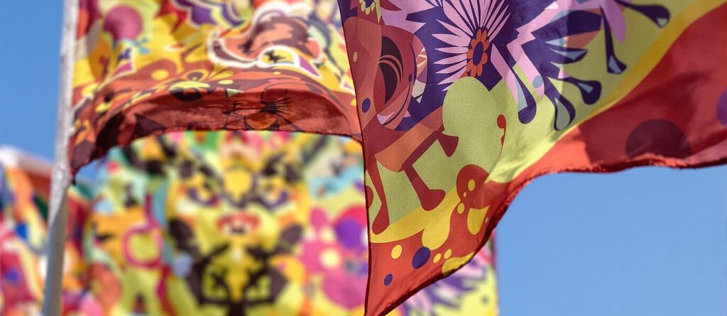 Custom flags blowing in a gentle breeze.
