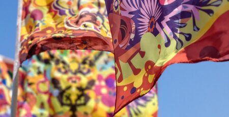 Custom flags blowing in a gentle breeze.