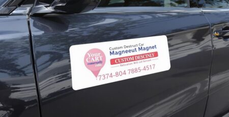 Large rectangular car magnet on vehicle door.